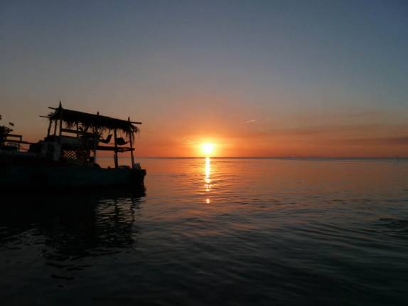 O incrível pôr-do-sol em Caye Caulker, na grande barreira de corais de Belize